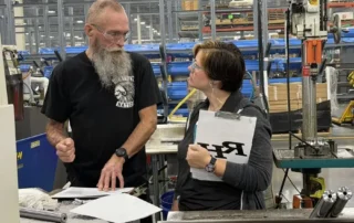 Chanelle Sheets, right, Richmond Hill High School graphics and print teacher, during the RISE Educator Externship at Daniel Defense in Bryan County